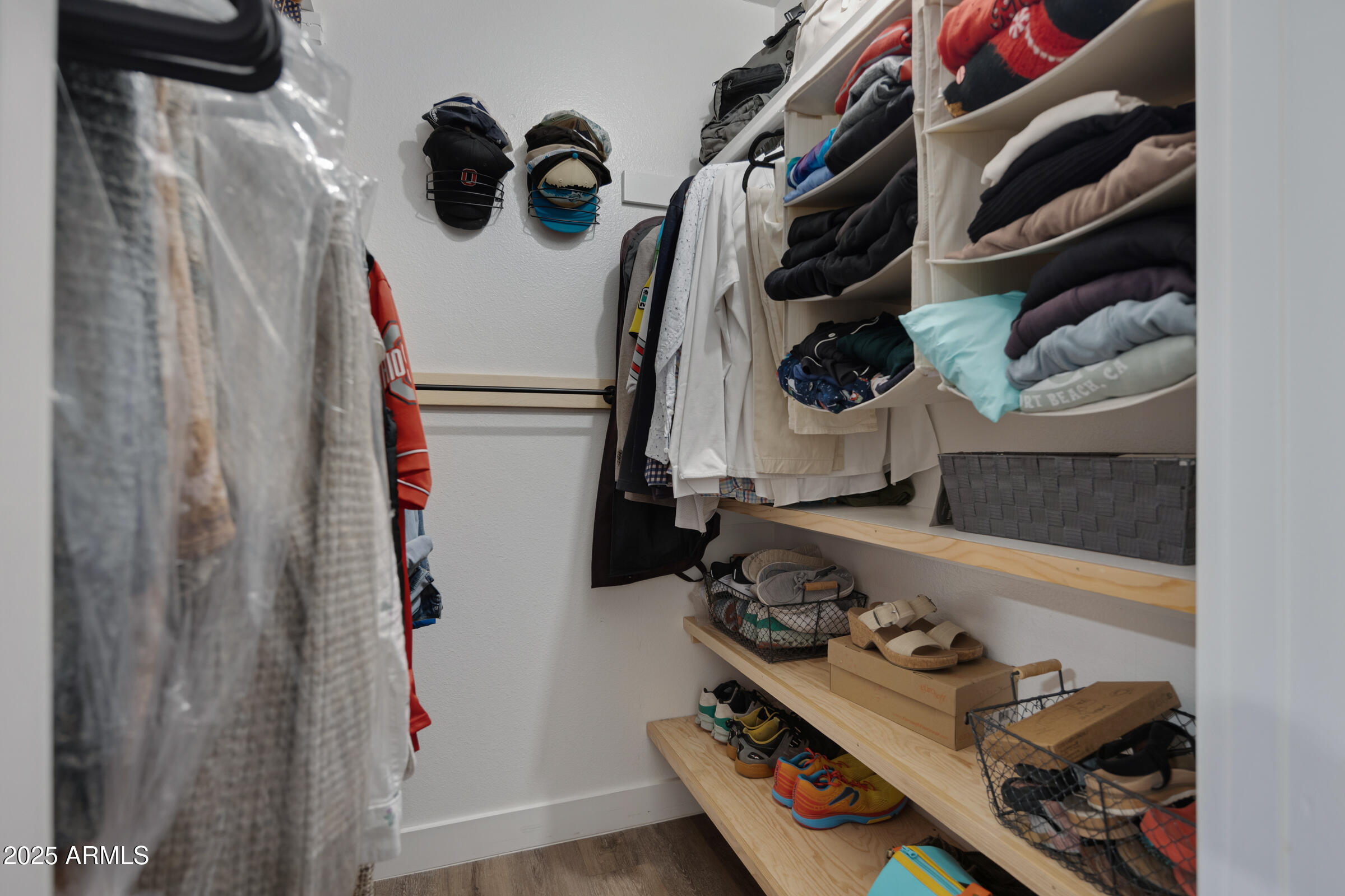 1824 West Seldon Lane Phoenix, AZ 85021 - Photo 20 of 34 a room with lots of different colored cloths