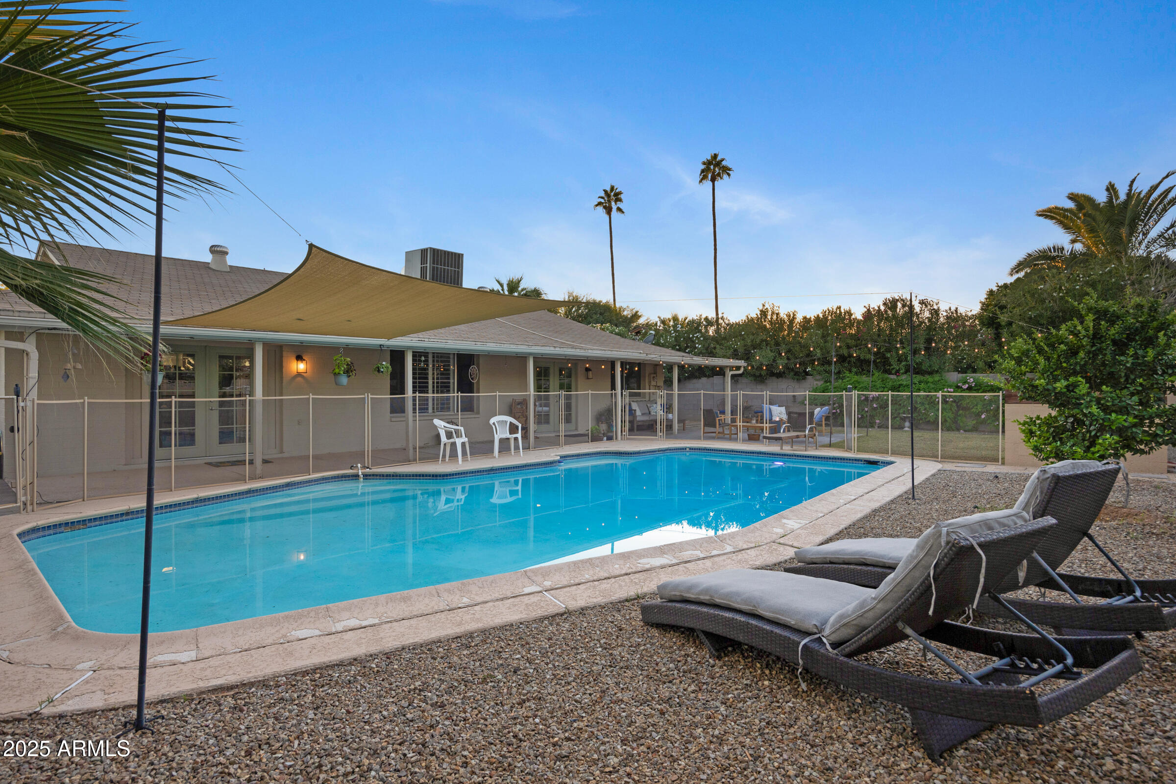 1824 West Seldon Lane Phoenix, AZ 85021 - Photo 29 of 34 a view of a house with a backyard and sitting area