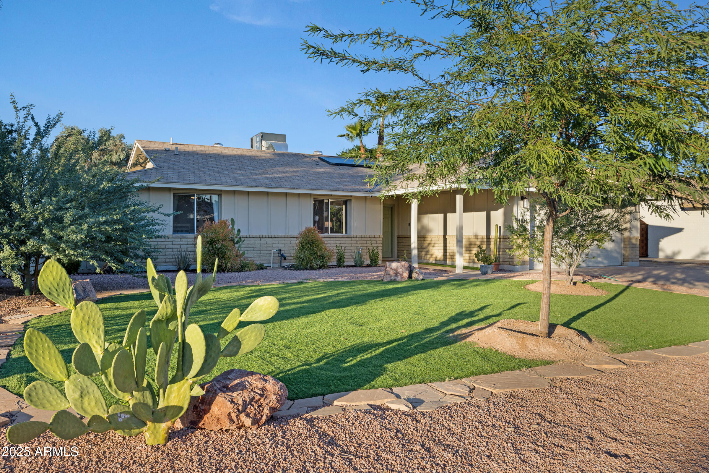 1824 West Seldon Lane Phoenix, AZ 85021 - Photo 30 of 34 a view of a house with backyard and sitting area