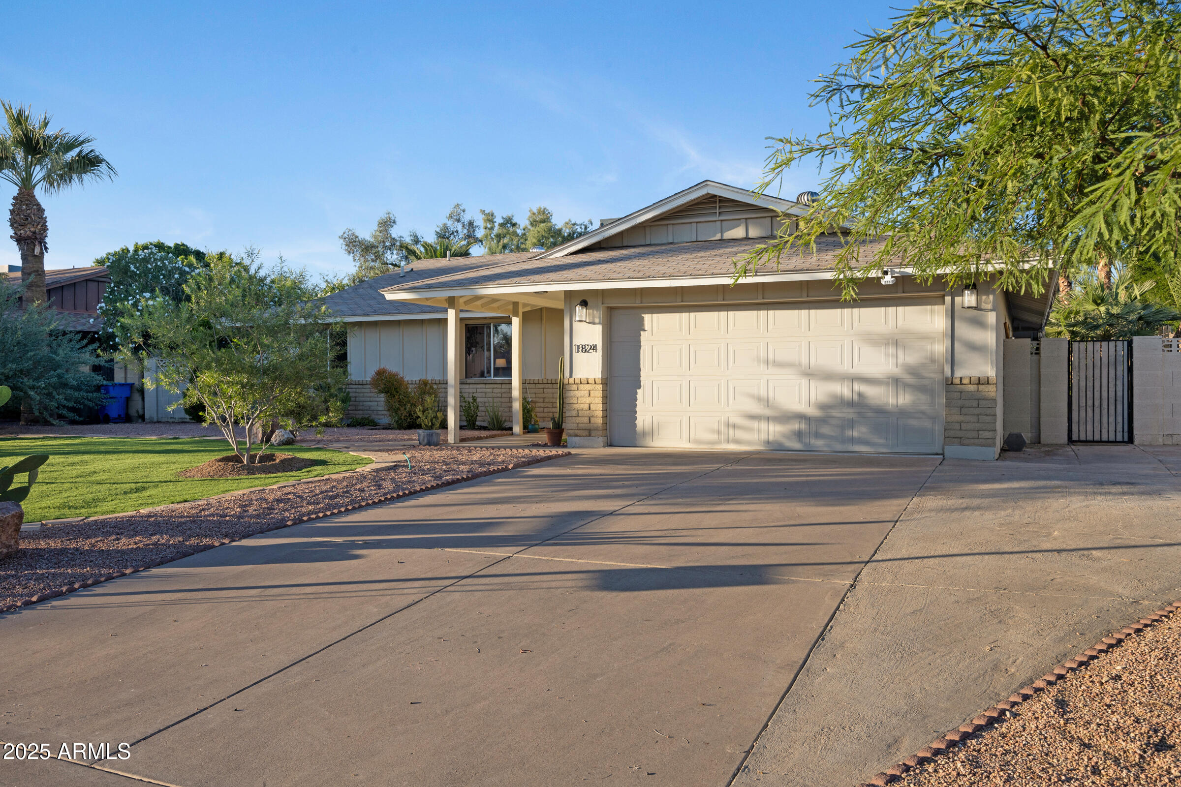 1824 West Seldon Lane Phoenix, AZ 85021 - Photo 31 of 34 a view of a house with a yard