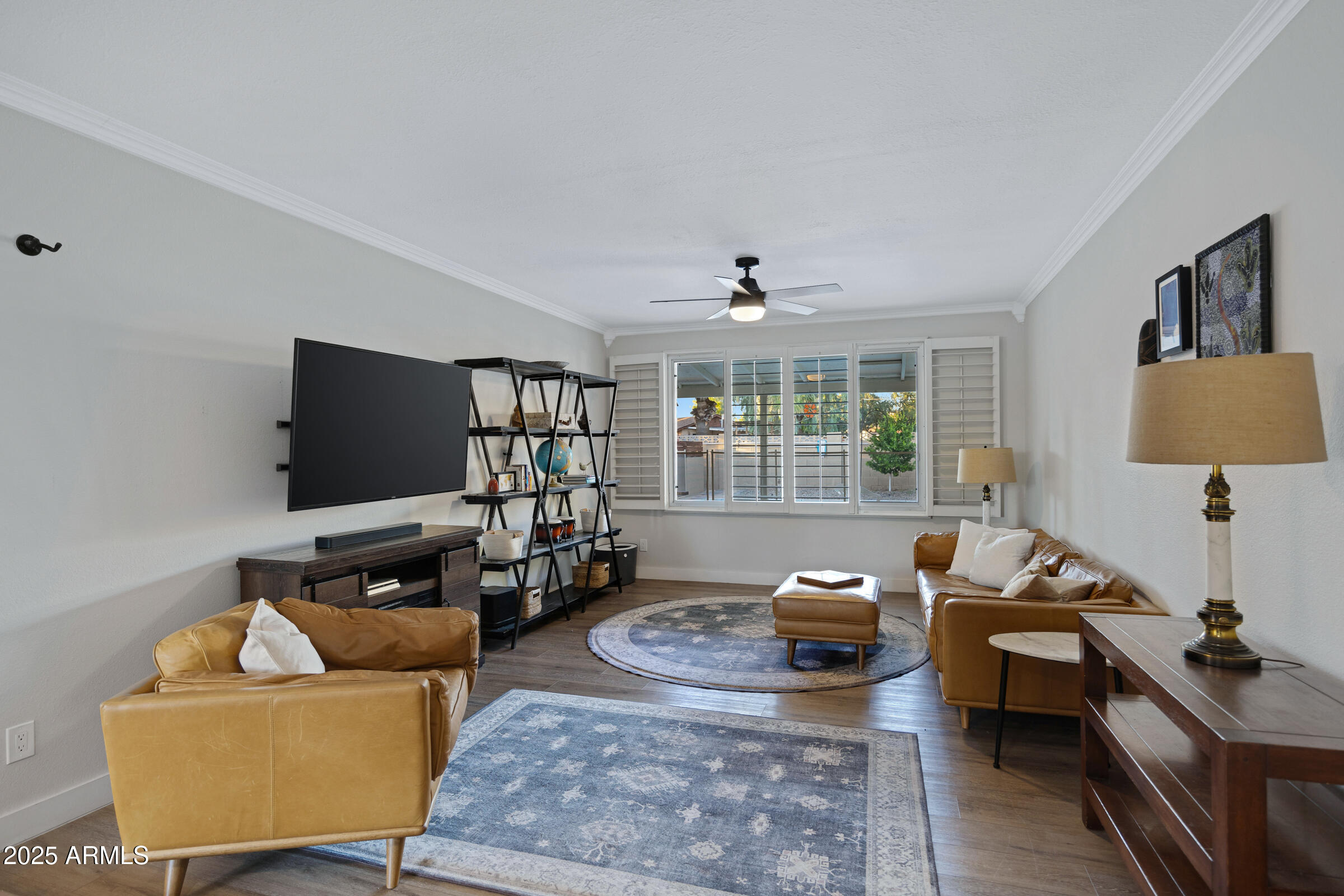 1824 West Seldon Lane Phoenix, AZ 85021 - Photo 5 of 34 a living room with furniture and a flat screen tv