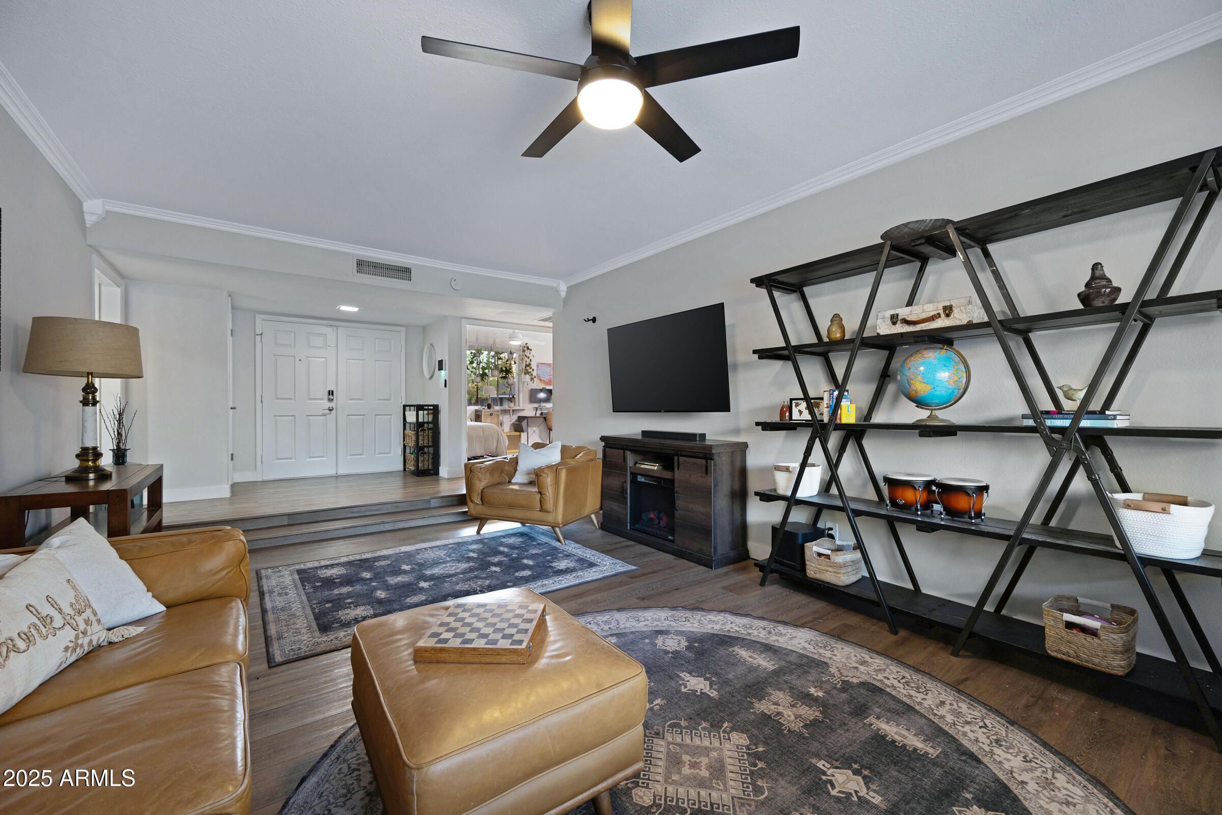 1824 West Seldon Lane Phoenix, AZ 85021 - Photo 6 of 34 a living room with furniture and a flat screen tv