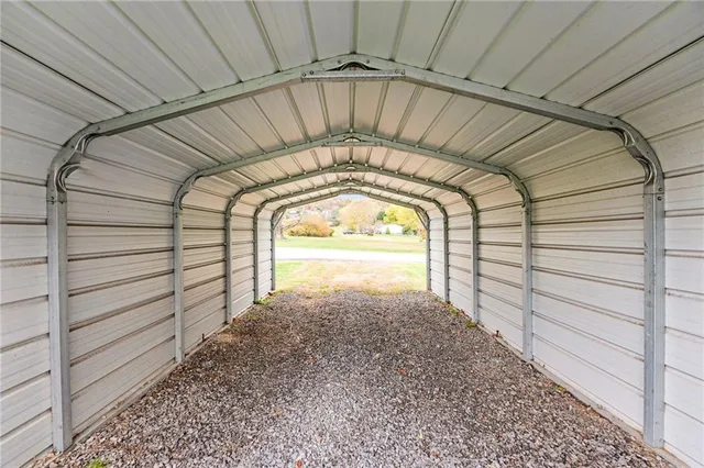 a view of empty room with a sink