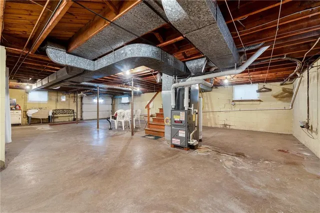 a view of a house with a porch and a sitting area