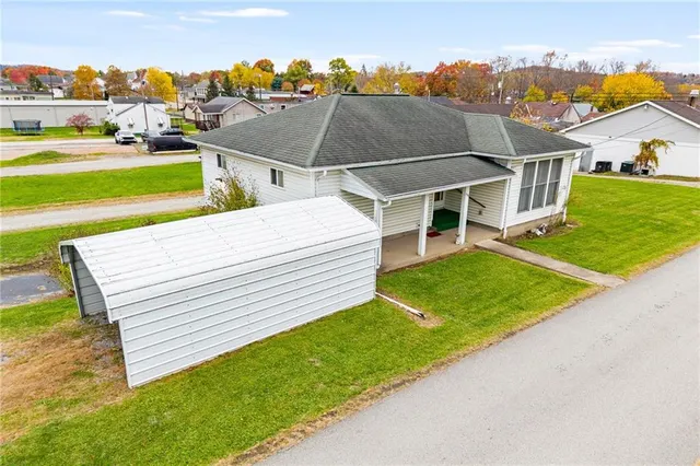 a view of yard with swimming pool
