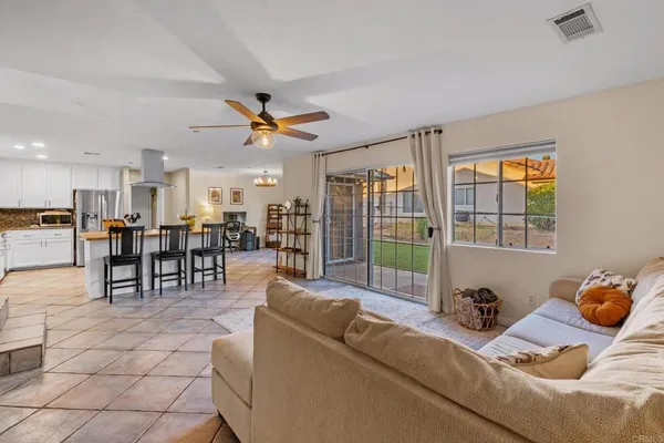 a living room with furniture and a table