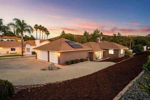 a view of house with outdoor space and street view