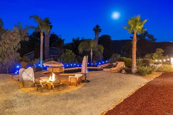 a view of a chairs and tables in patio