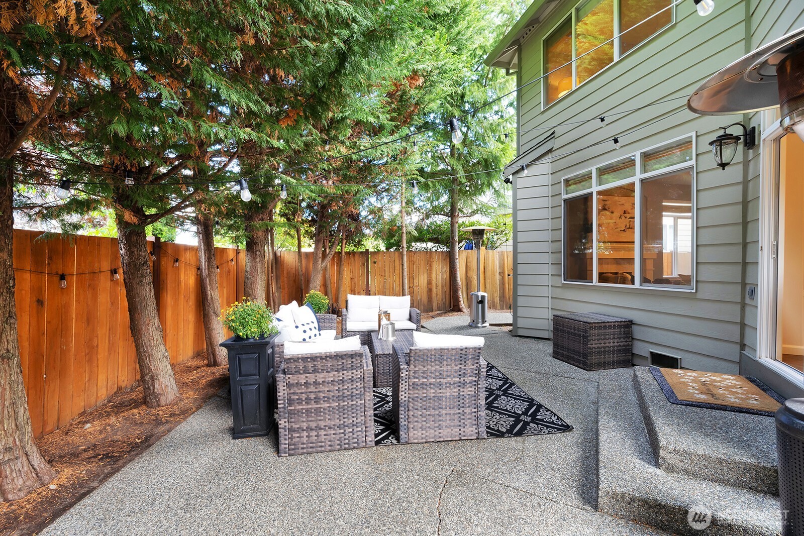 3208 175th Street Southeast Bothell, WA 98012 - Photo 16 of 34 a view of a patio with table and chairs