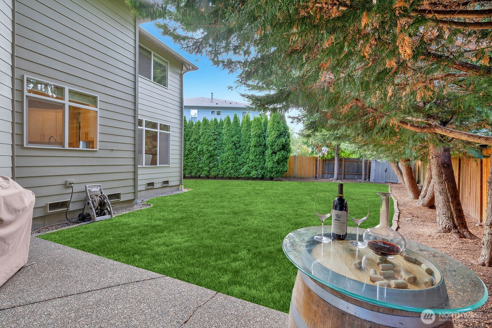 3208 175th Street Southeast Bothell, WA 98012 - Photo 17 of 34 a backyard of a house with seating space