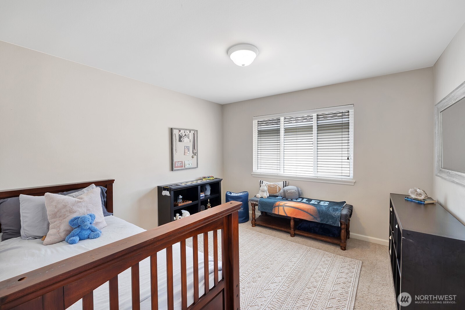 3208 175th Street Southeast Bothell, WA 98012 - Photo 26 of 34 a bedroom with furniture and a window