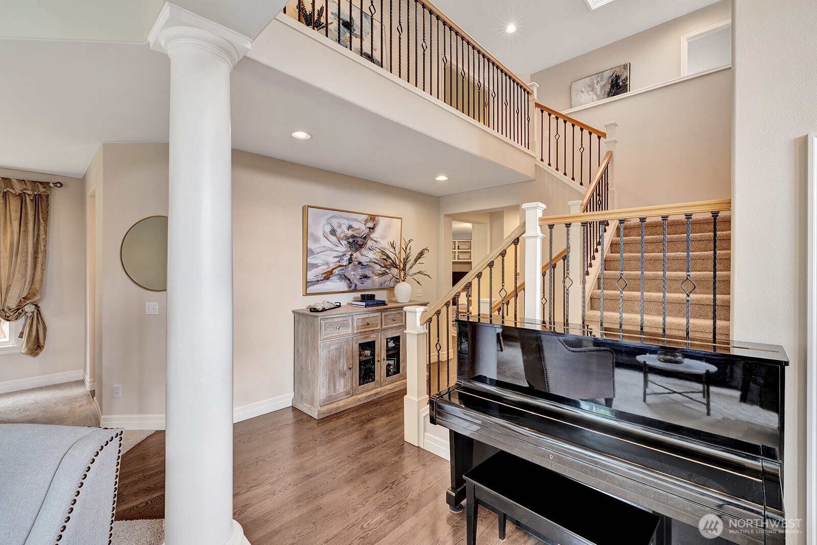 3208 175th Street Southeast Bothell, WA 98012 - Photo 8 of 34 a view of a livingroom with furniture and staircase