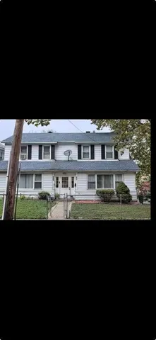 a view of a building with a big yard
