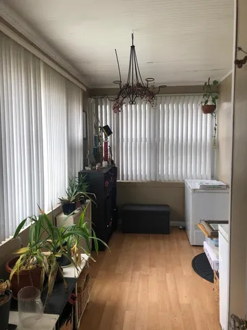 a kitchen with granite countertop a refrigerator and a sink