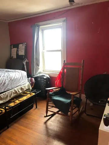 a bedroom with a bed