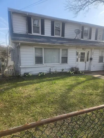 a view of a house with a swimming pool