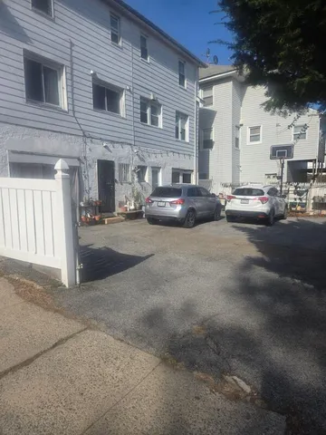 a view of a street with cars