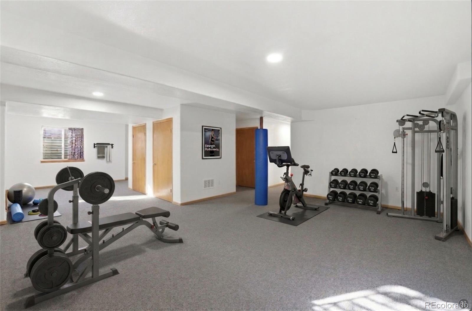 10917 Ammons Street Broomfield, CO 80021 - Photo 37 of 47 a view of a room with gym equipment