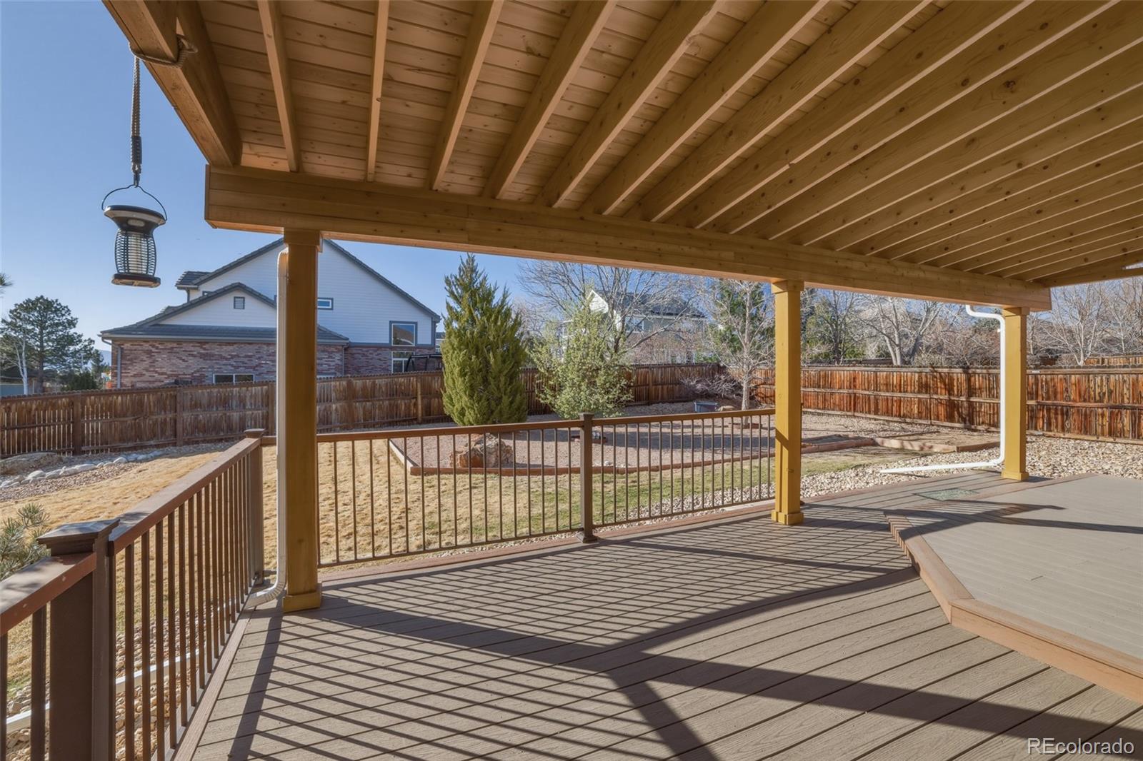 10917 Ammons Street Broomfield, CO 80021 - Photo 41 of 47 a view of a balcony with wooden floor