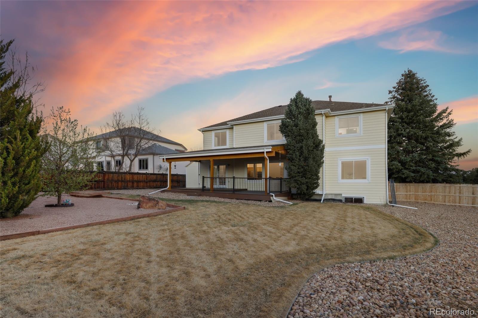 10917 Ammons Street Broomfield, CO 80021 - Photo 44 of 47 a view of a house with a patio
