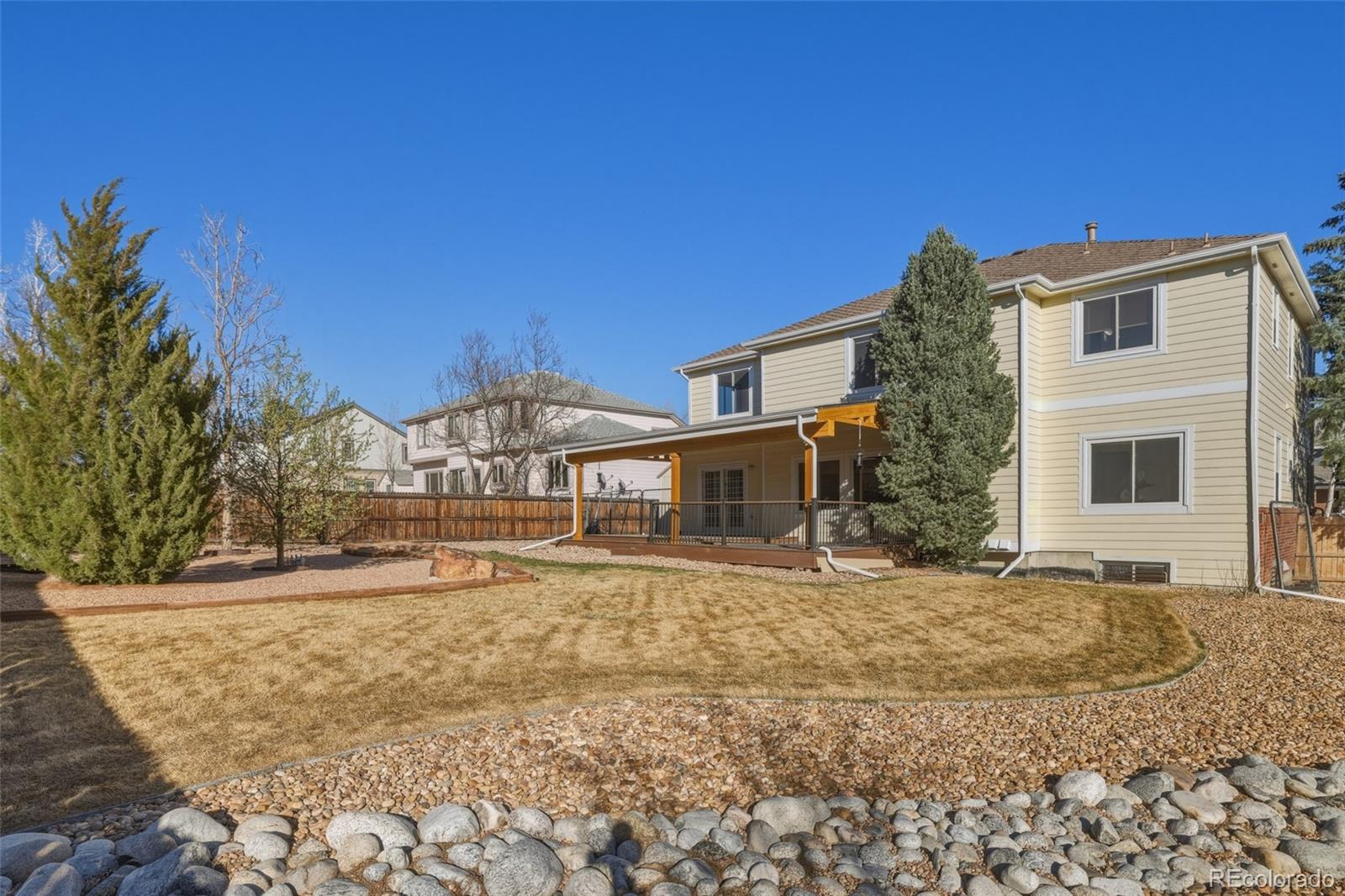 10917 Ammons Street Broomfield, CO 80021 - Photo 45 of 47 a view of a house with a snow on the road