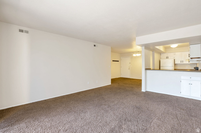 290 North 500 West, Unit 211 Bountiful, UT 84010 - Photo 6 of 21 Living Room Looking Into Kitchen and Dining Room