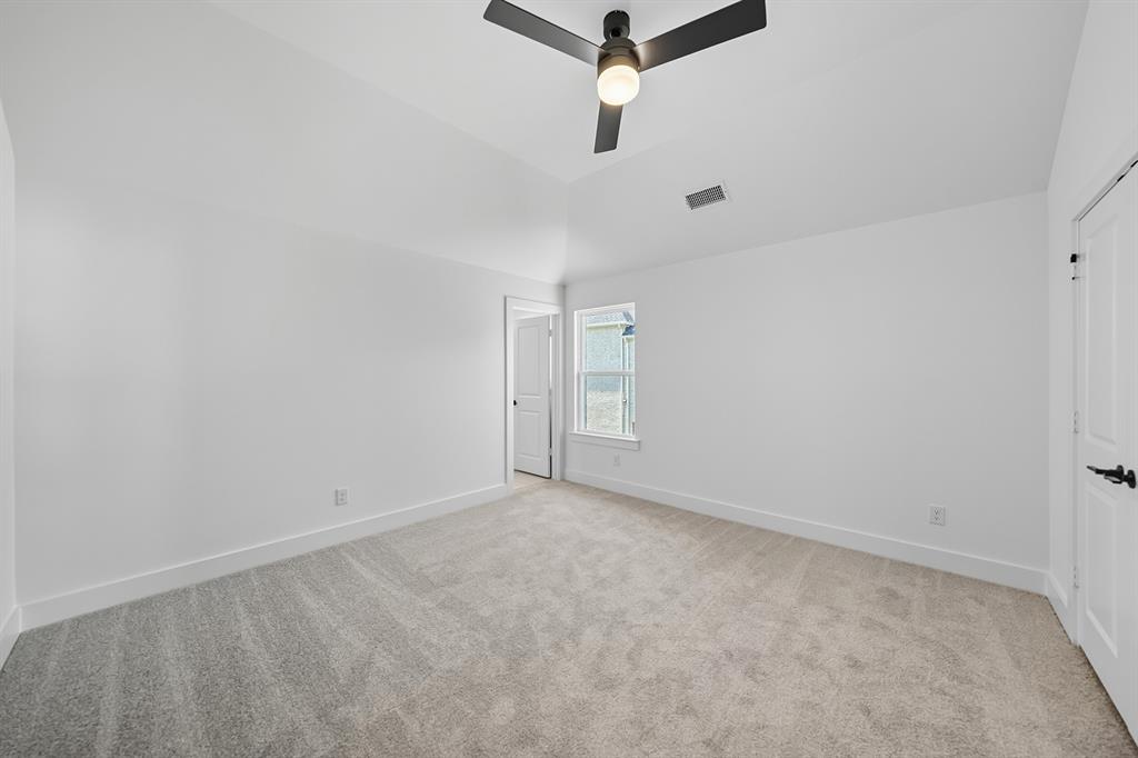 587 Mayfair Lane Frisco, TX 75033 - Photo 27 of 37 a view of a room with a fan