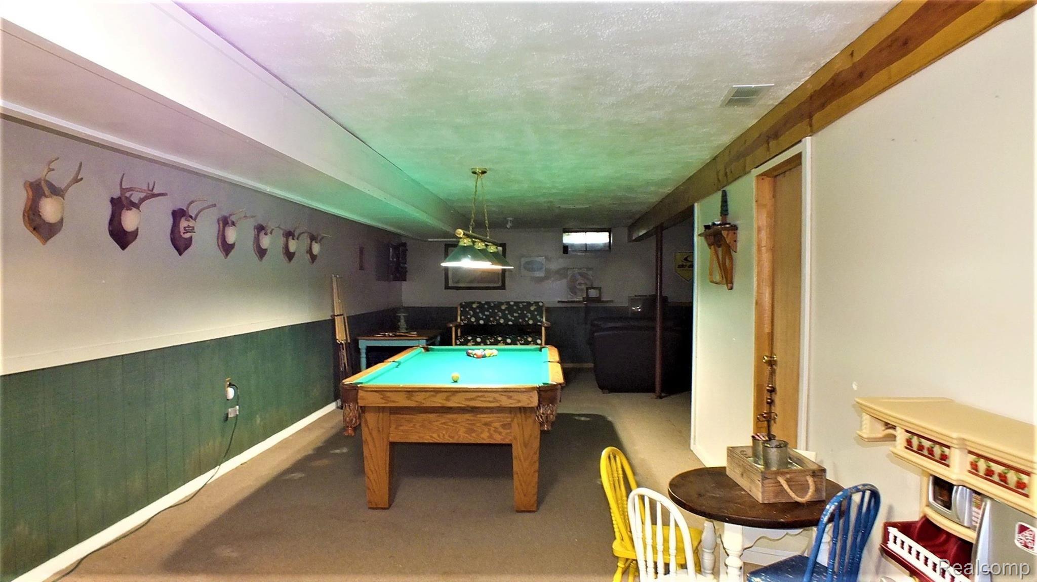 5381 Oak Grove Road Howell, MI 48855 - Photo 16 of 19 basement rec area.JPG