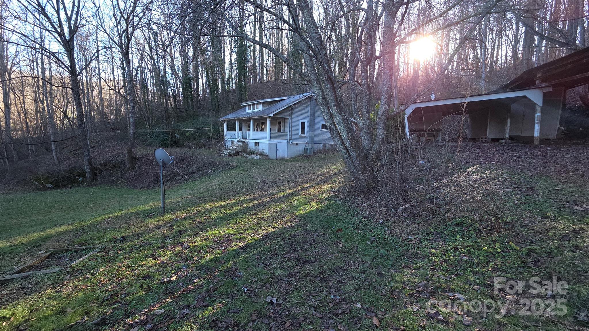 39 Henry Road Sylva, NC 28779 - Photo 19 of 20 a view of a house with a yard