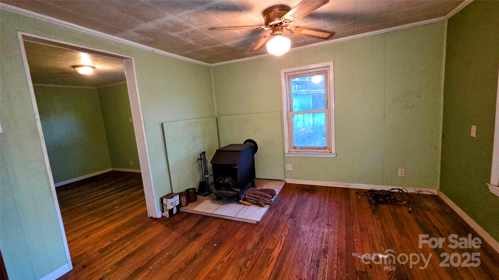 39 Henry Road Sylva, NC 28779 - Photo 3 of 20 a view of a workspace with furniture and wooden floor