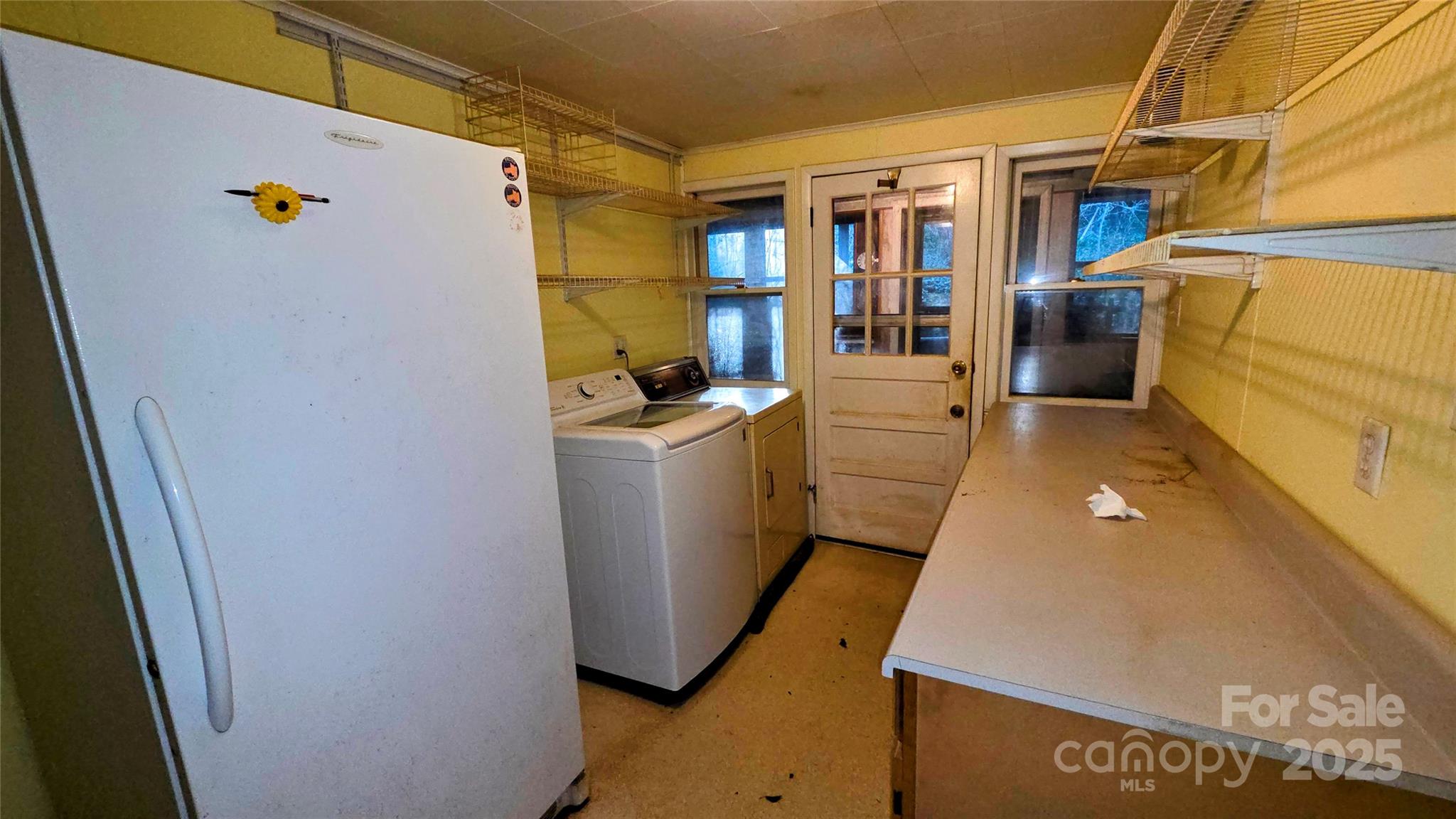 39 Henry Road Sylva, NC 28779 - Photo 7 of 20 a utility room with dryer and washer