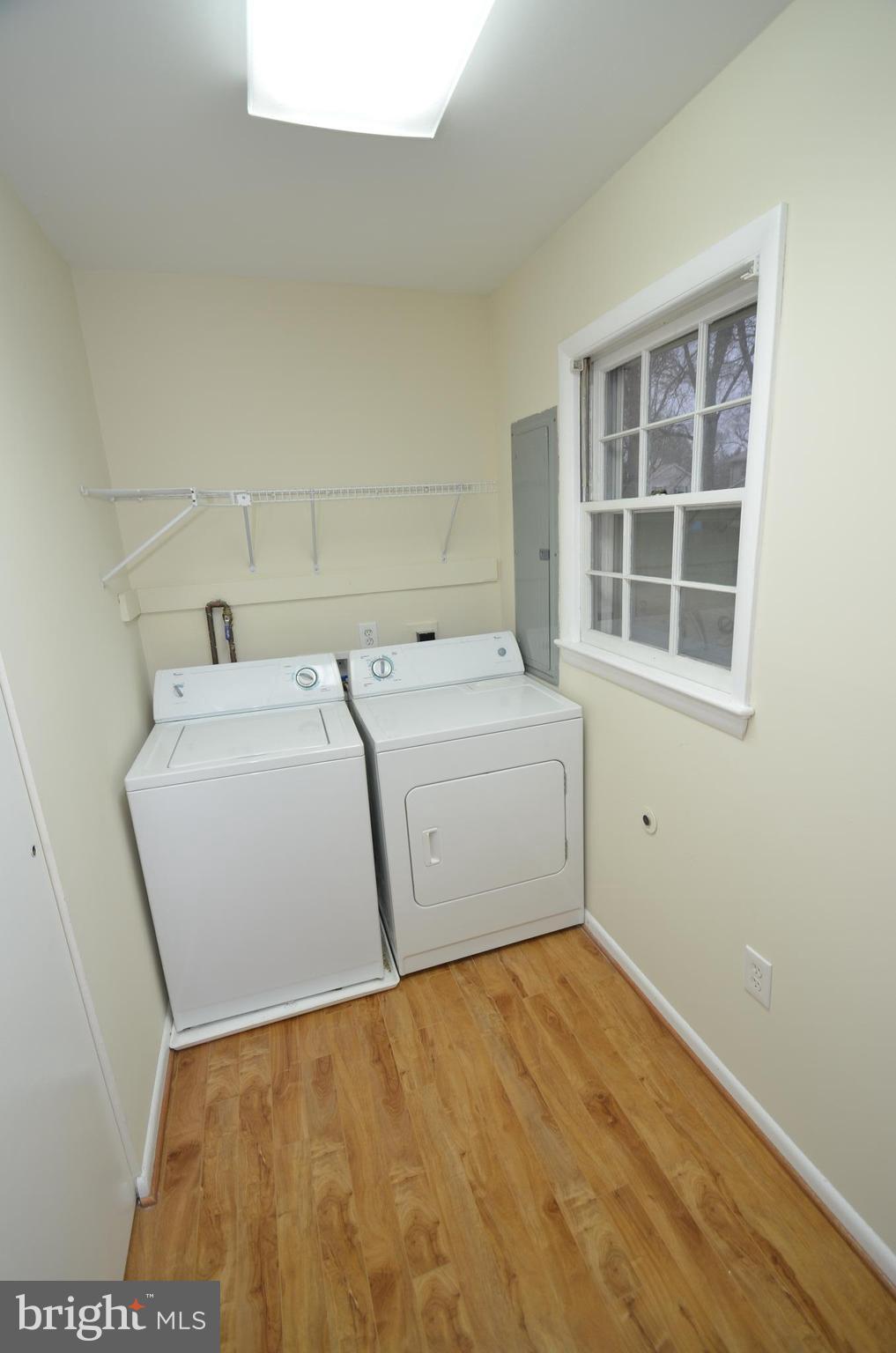 5612 Ashfield Road Alexandria, VA 22315 - Photo 24 of 29 a utility room with dryer and washer