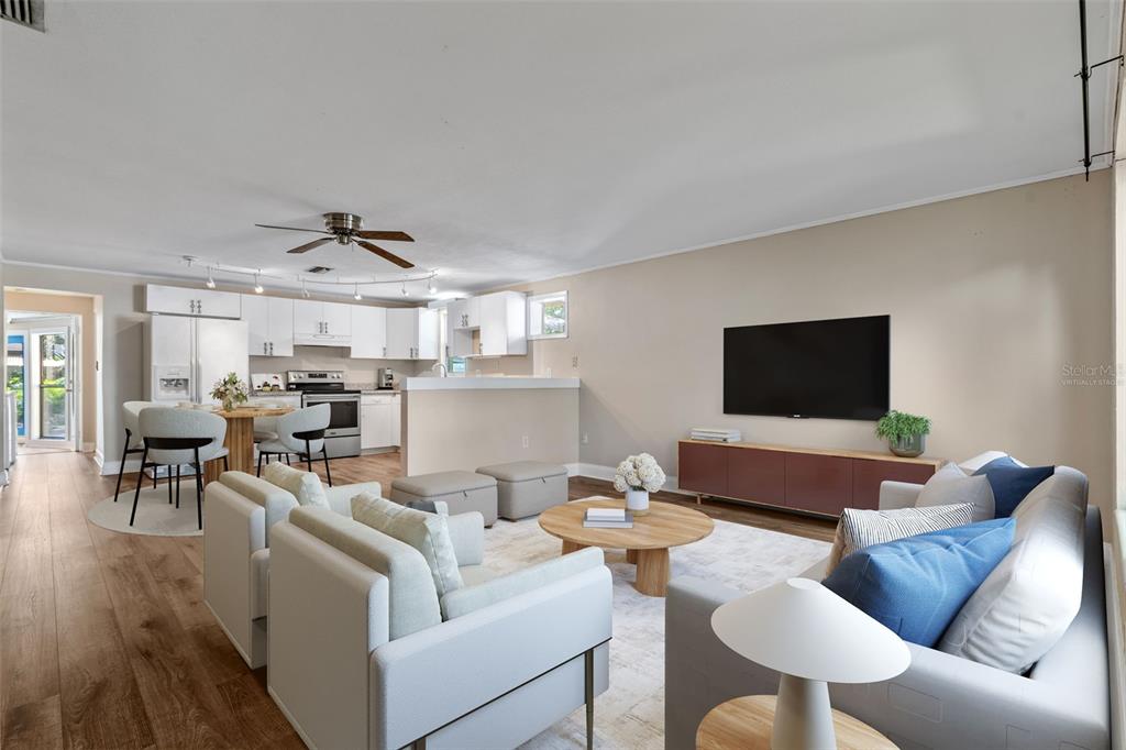 2380 Bay Street Sarasota, FL 34237 - Photo 11 of 48 a living room with furniture and a flat screen tv