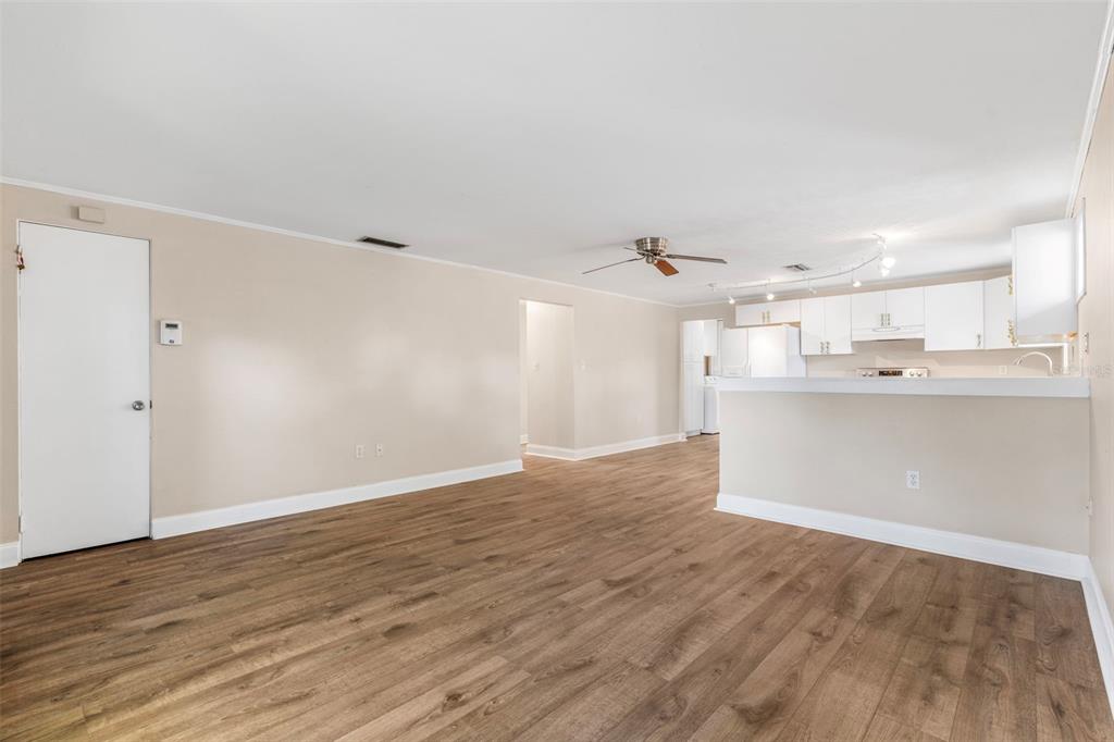 2380 Bay Street Sarasota, FL 34237 - Photo 12 of 48 a view of kitchen with wooden floor and window