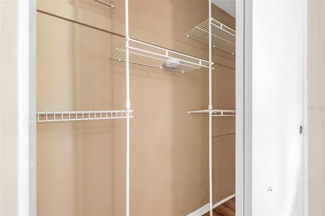 a view of a room with racks on the wall