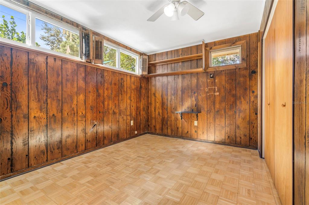 2380 Bay Street Sarasota, FL 34237 - Photo 27 of 48 a view of a garage with wooden walls