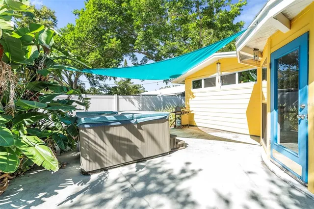 a view of a two chair in the patio