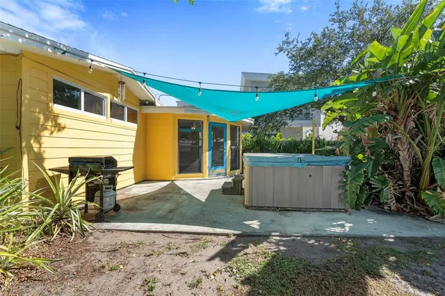 a view of a back yard of the house