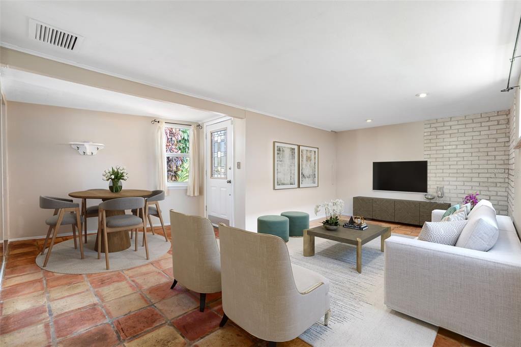 2380 Bay Street Sarasota, FL 34237 - Photo 9 of 48 a living room with furniture and a flat screen tv