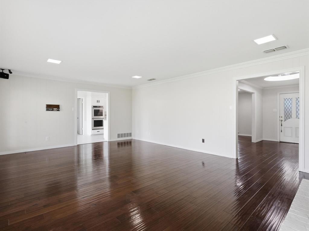 4300 Winding Way Benbrook, TX 76126 - Photo 11 of 24 a view of empty room with wooden floor