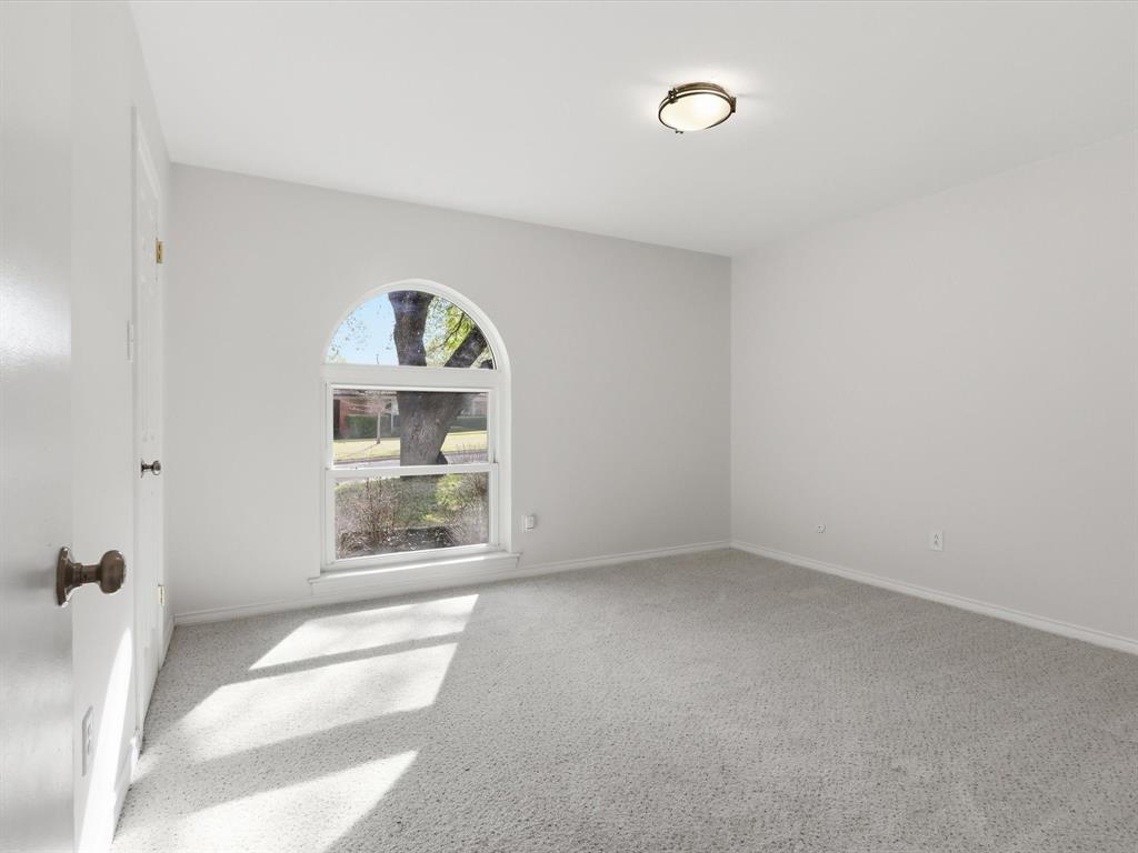 4300 Winding Way Benbrook, TX 76126 - Photo 17 of 24 a view of an empty room with a window