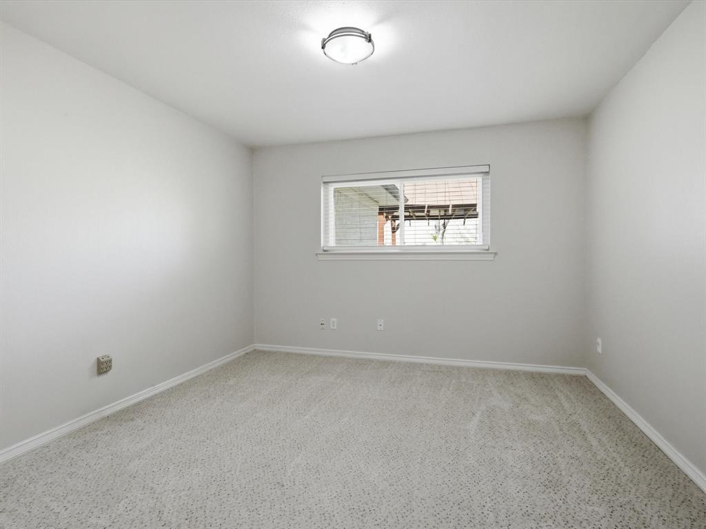 4300 Winding Way Benbrook, TX 76126 - Photo 18 of 24 an empty room with a window