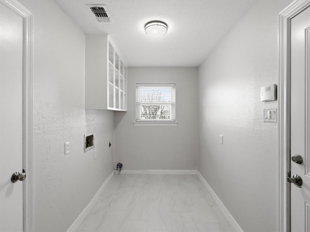 4300 Winding Way Benbrook, TX 76126 - Photo 21 of 24 an empty room with windows