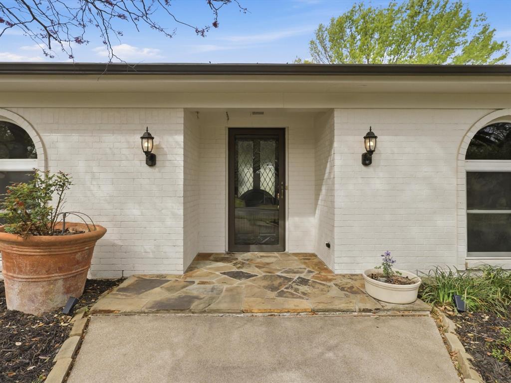 4300 Winding Way Benbrook, TX 76126 - Photo 3 of 24 a view of a entryway door of the house