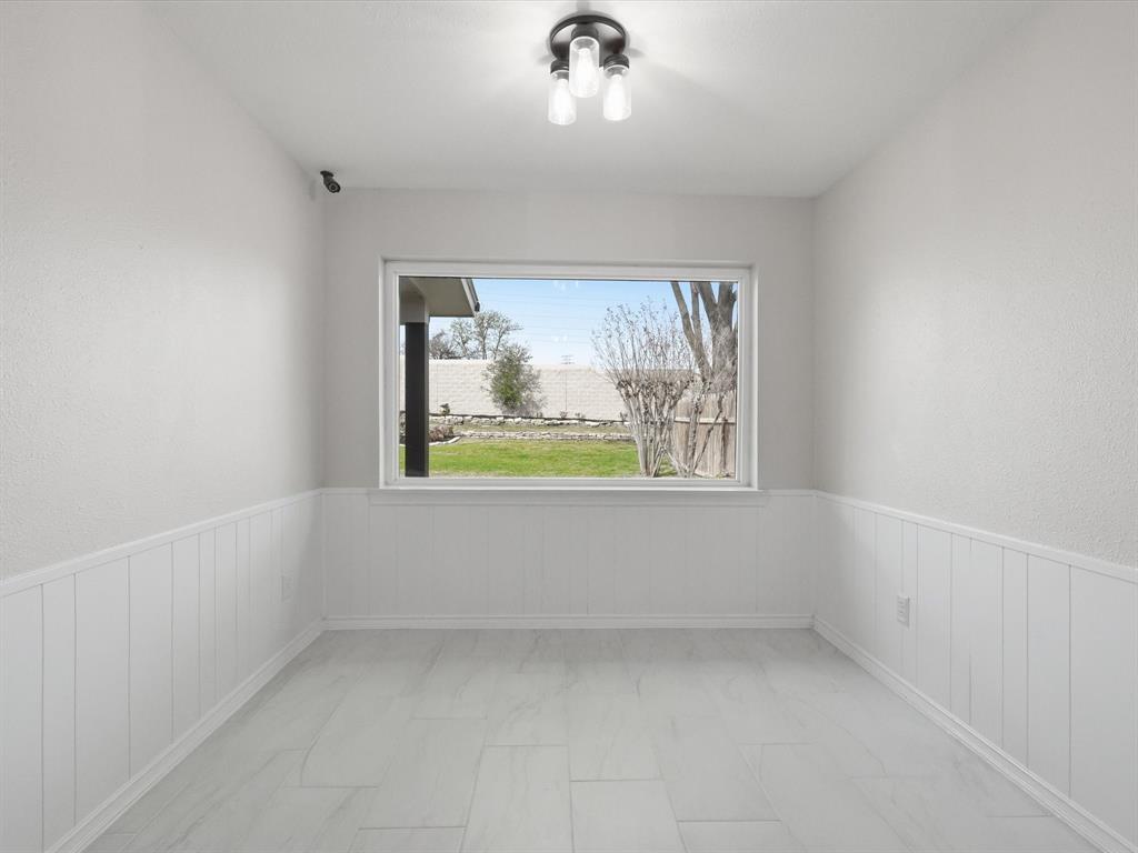 4300 Winding Way Benbrook, TX 76126 - Photo 8 of 24 an empty room with windows