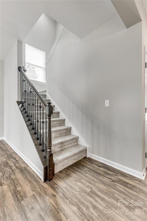 6403 Bluegill Road Charlotte, NC 28216 - Photo 18 of 48 a view of entryway and hall with wooden floor