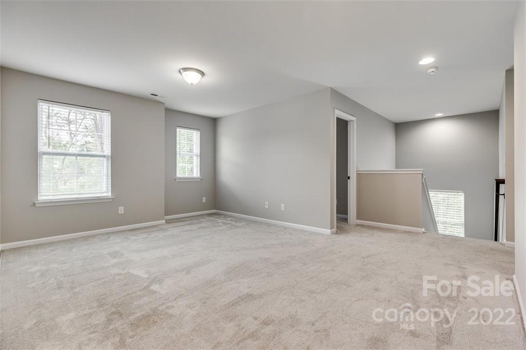 6403 Bluegill Road Charlotte, NC 28216 - Photo 19 of 48 a view of an empty room with a window