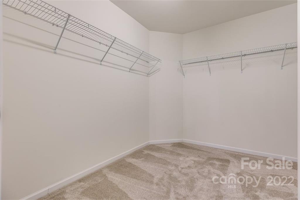 6403 Bluegill Road Charlotte, NC 28216 - Photo 27 of 48 a view of a room with racks on the wall