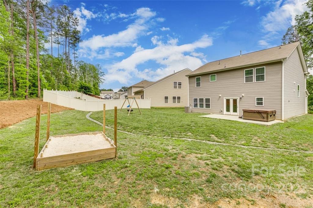 6403 Bluegill Road Charlotte, NC 28216 - Photo 40 of 48 a view of a house with backyard