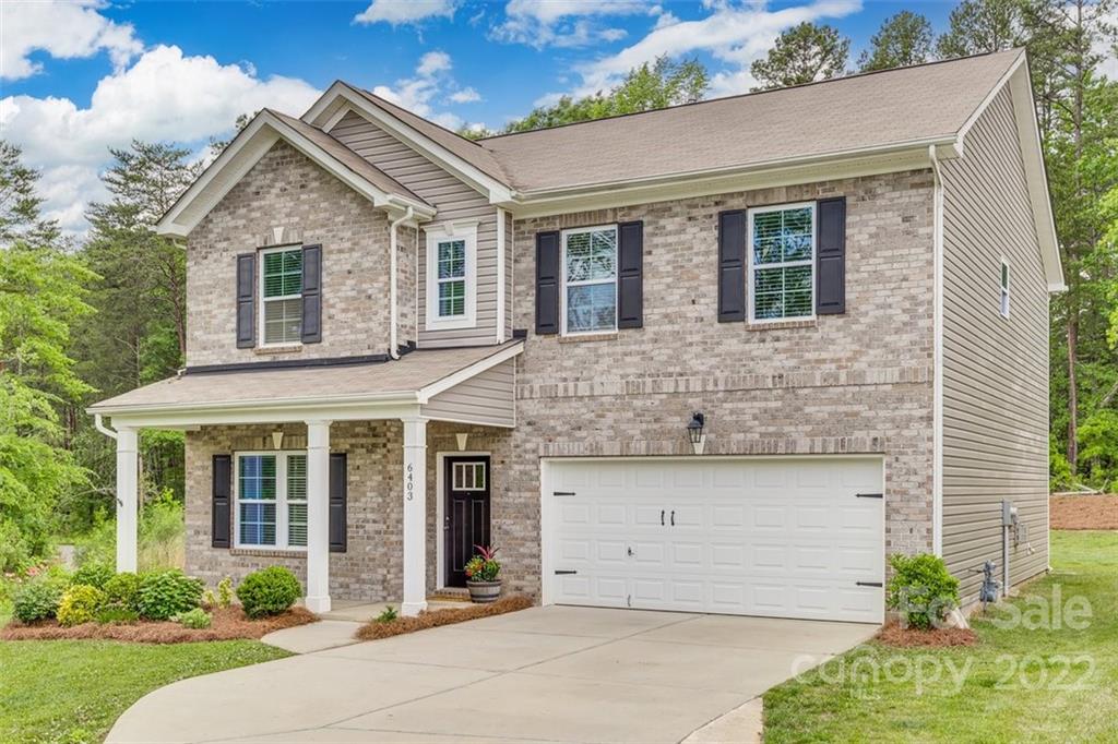 6403 Bluegill Road Charlotte, NC 28216 - Photo 41 of 48 front view of a house with a yard